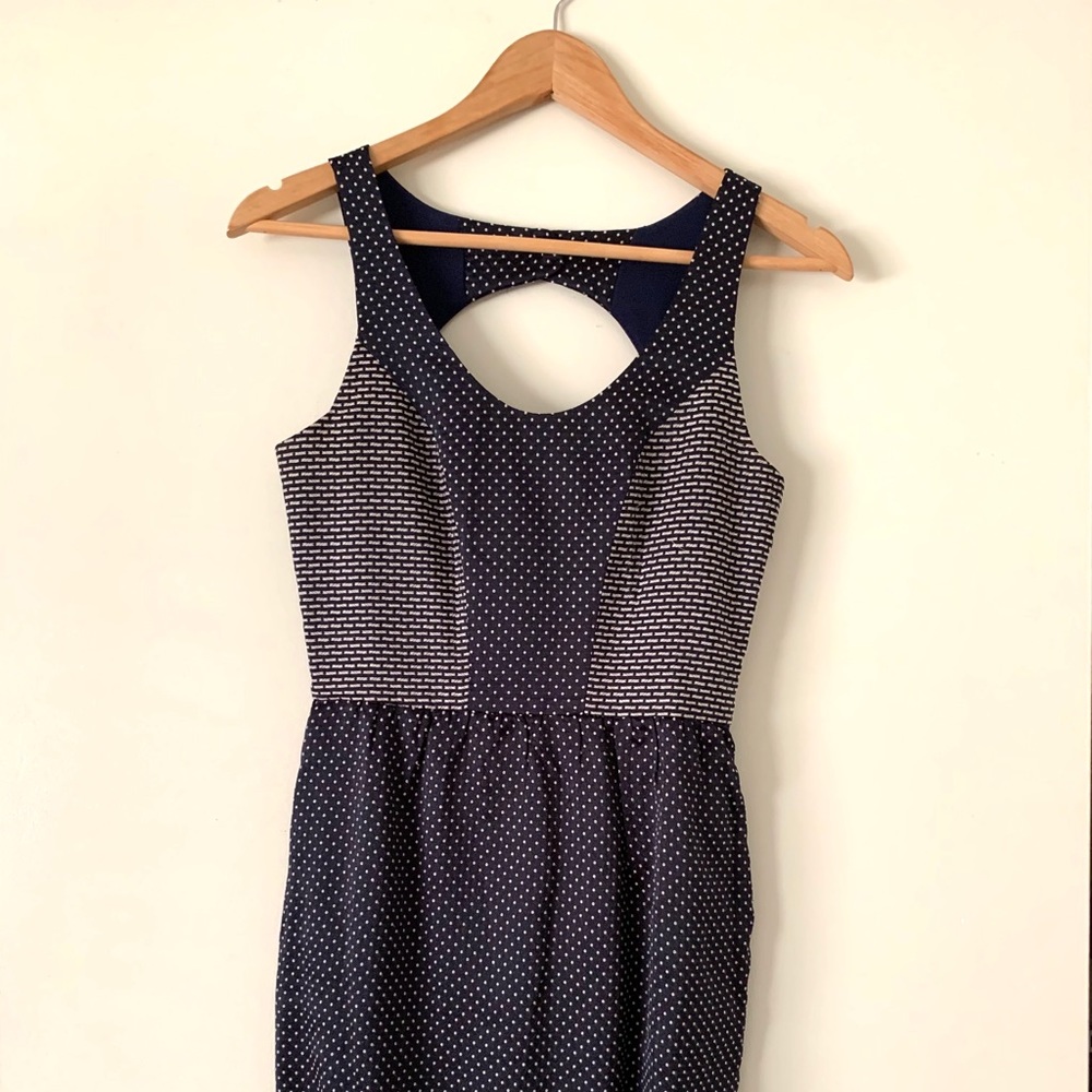 Navy blue dotted mini dress with open back